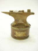 An apprentice brass model of an anvil:,