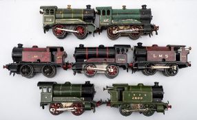 A group of seven Hornby O gauge 0-4-0 tank locomotives comprising two LMS maroon,