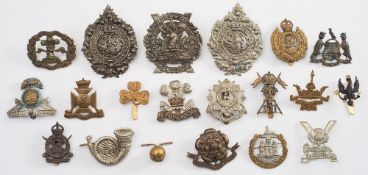 A collection of various cap badges:, including Argyle & Sutherland,