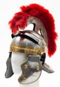 A reproduction Galea with red plume,: ridged eyebrows, and brass studwork.
