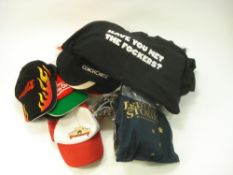 A collection of film promotional caps and t-shirts:, including 'The Matrix Re-loaded',