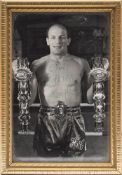 Henry Cooper (1934-2011) a signed black and white photograph:,