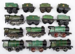 A group of seven Hornby O gauge tank locomotives and tenders in green:, various cab numbers.