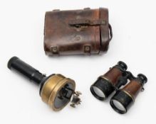 A pair of WWI period binoculars:, brown leather covered tubes with black lacquer finish,