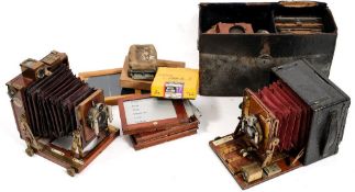A Thornton Picard 'Amber' mahogany and brass quarter plate camera and a Sanderson quarter plate