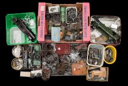 A collection of miscellaneous O gauge clockwork engine parts and spares,
