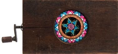 Three 19th century chromotrope magic lantern slides:, unsigned, each with double panel rack work, 7.