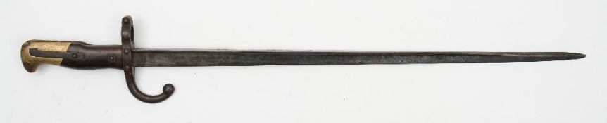 A French 1874 pattern Label bayonet, together with an 186 pattern Chassepot bayonet in scabbard:,