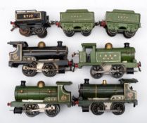 A group of four Hornby O gauge 0-4-0 locomotives:, comprising two LNER green with tenders,