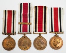 A group of four Special Constabulary Long Service Medals:,