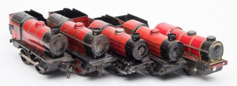A group of four Hornby O gauge clock work 0-4-0 tank locomotives:, and three tenders,