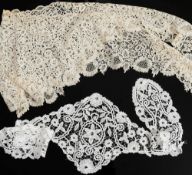 A late 19th century Honiton lace shawl:, together with a Honiton lace collar,