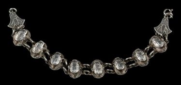 An Egyptian Revival scarab beetle motif bracelet: on bolt ring clasp.