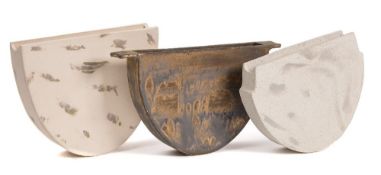 *Val Barry (1937-2018) three stoneware 'flattened bowls': of narrow profile on demi-lune bases