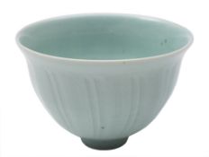 *David Leach (1911 - 2005) a porcelain bowl: of footed circular form with incised linear decoration