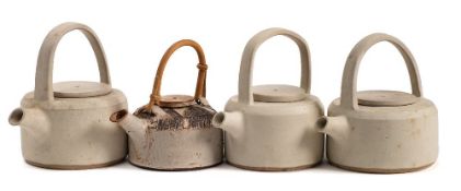 *Val Barry (1937-2018) three stoneware teapots and a terracotta teapot: the former of flattened