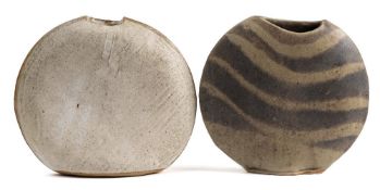 *Val Barry (1937-2018) two stoneware 'moon' vases: of narrow slab built form with distorted profile,