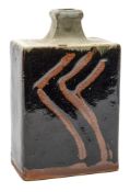 *Shoji Hamada (1894 - 1978) a stoneware bottle vase: of rectangular slab built form with short