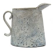 *Emmanuel Cooper (1938 - 2012) a stoneware jug: of flattened elliptical form with raised spout and