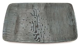 *Peter Wright (1919 - 2003) a stoneware dish: of slab built rounded rectangular form with pale blue