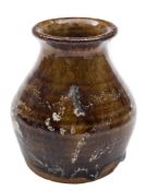 *Bernard Leach (1887 - 1979) a stoneware vase: of squat form with flaring neck under brown and