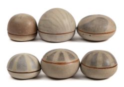 *Val Barry (1937-2018) six stoneware boxes and covers: of circular domed form with wax resist
