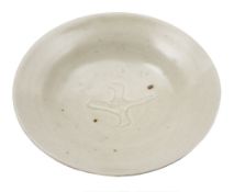 * Bernard Leach (1887 - 1979) a porcelain shallow dish: of footed circular form,