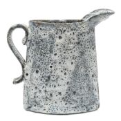 *Emmanuel Cooper (1938 - 2012) a stoneware jug: of flattened elliptical form with raised spout and
