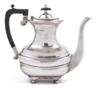 A George V silver coffee pot, maker Walker & Hall, Sheffield, 1932: of barge -shaped outline,
