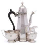 A George V silver three-piece coffee service, maker Thomas Bradbury & Sons Ltd, London,