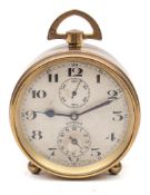 A small brass Zenith clock: having an eight-day duration timepiece movement,