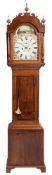 A mid-19th century mahogany longcase clock: the eight-day duration movement striking the hours on a