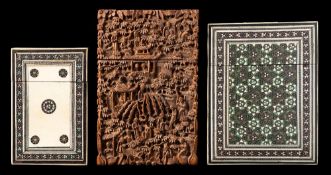 A Canton sandalwood card case and two Indian sadeli ware ivory card cases: the first profusely