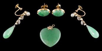 A pair of early 20th century jade,