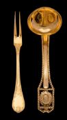 A Dutch silver gilt sauce ladle,