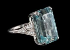 An aquamarine single-stone ring: the rectangular aquamarine approximately 17.