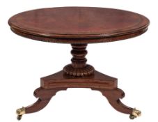 A Regency mahogany library table:,
