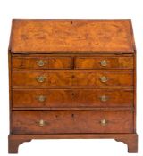 An 18th Century and later walnut and pollard elm bureau:,