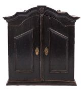 An 18th Century Dutch stained pine hanging domed cabinet:,