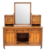 An Aesthetic movement oak, inlaid and decorated bedroom suite:,