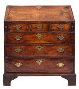 An early 18th Century walnut and fruitwood bureau:,