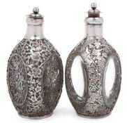 A pair of early 20th century Chinese silver mounted Dimple Haigh whiskey bottles,