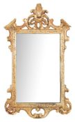 A carved giltwood and gesso wall mirror in the 18th Century style:,