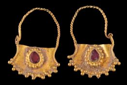 A pair of antique Roman gold and red glass drop earrings: each with a fan-shaped drop with beaded