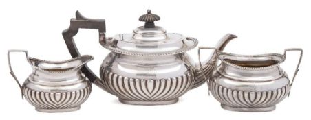 A Victorian bachelor's silver three-piece tea service, maker Henry Atkin, Sheffield,