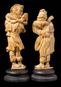 A pair of late 19th century Dieppe carved ivory figures: peasant musicians,