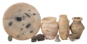 An alabaster small pot: with lug handles, together with a tapering vase with pierced lug handles,