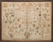 An early 19th century sampler: with central verse enclosed by assorted motifs of flowering bushes,