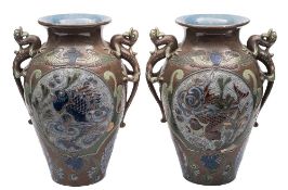 A pair of large Alexandra Lauder [Barnstaple] pottery vases: with grotesque serpent handles,