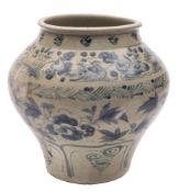 A Chinese blue and white 'fish' jar: of compressed globular form with rolled rim,